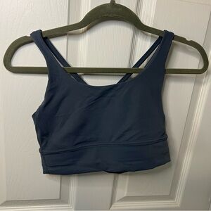Navy Blue Sports Bra with Wide Shoulder Straps and Moisture-Wicking Fabric